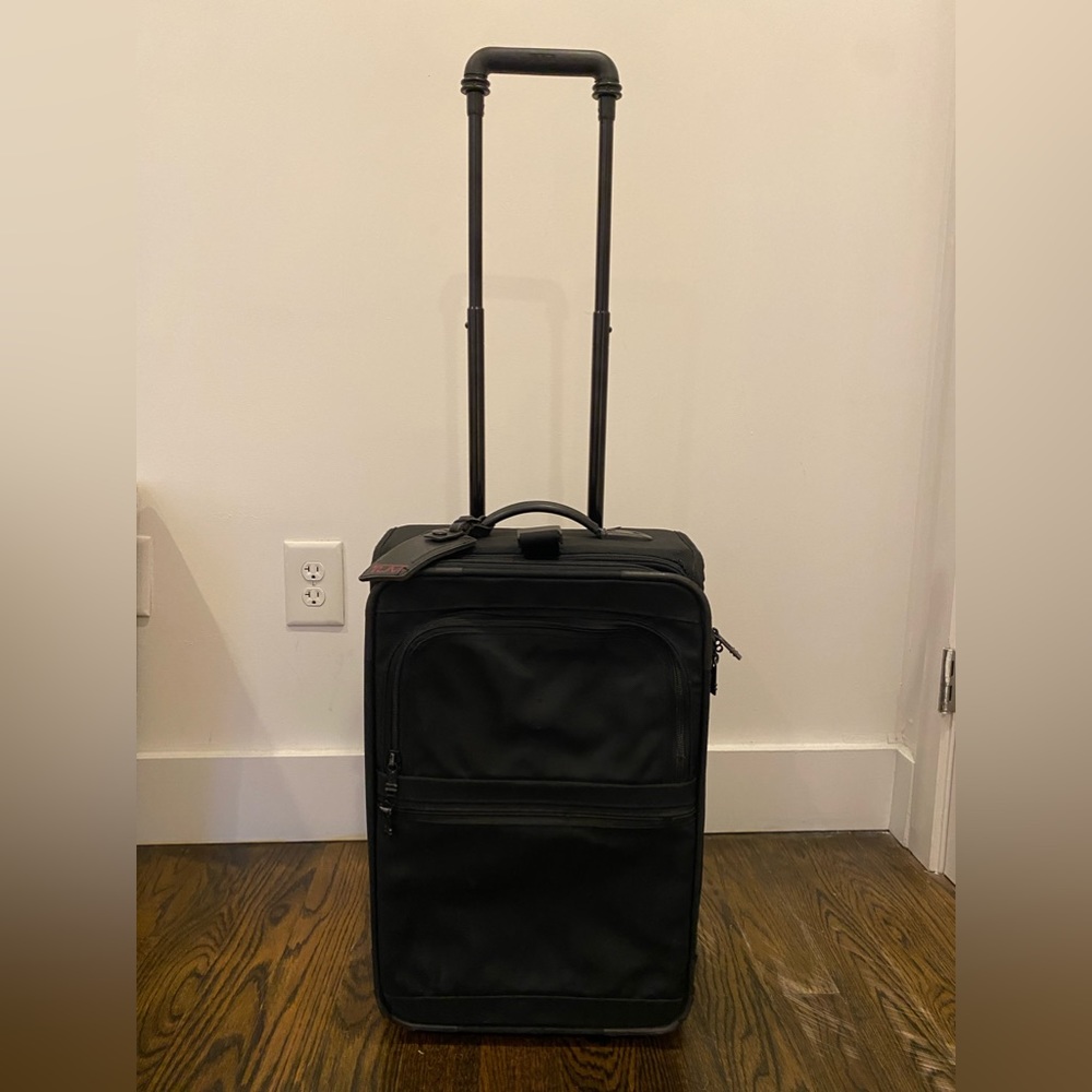 Tumi expandable carryon suitcase